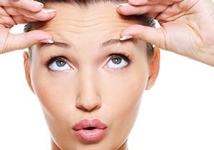 forehead reduction stock image