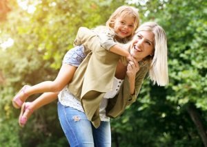 happy woman with child stock image